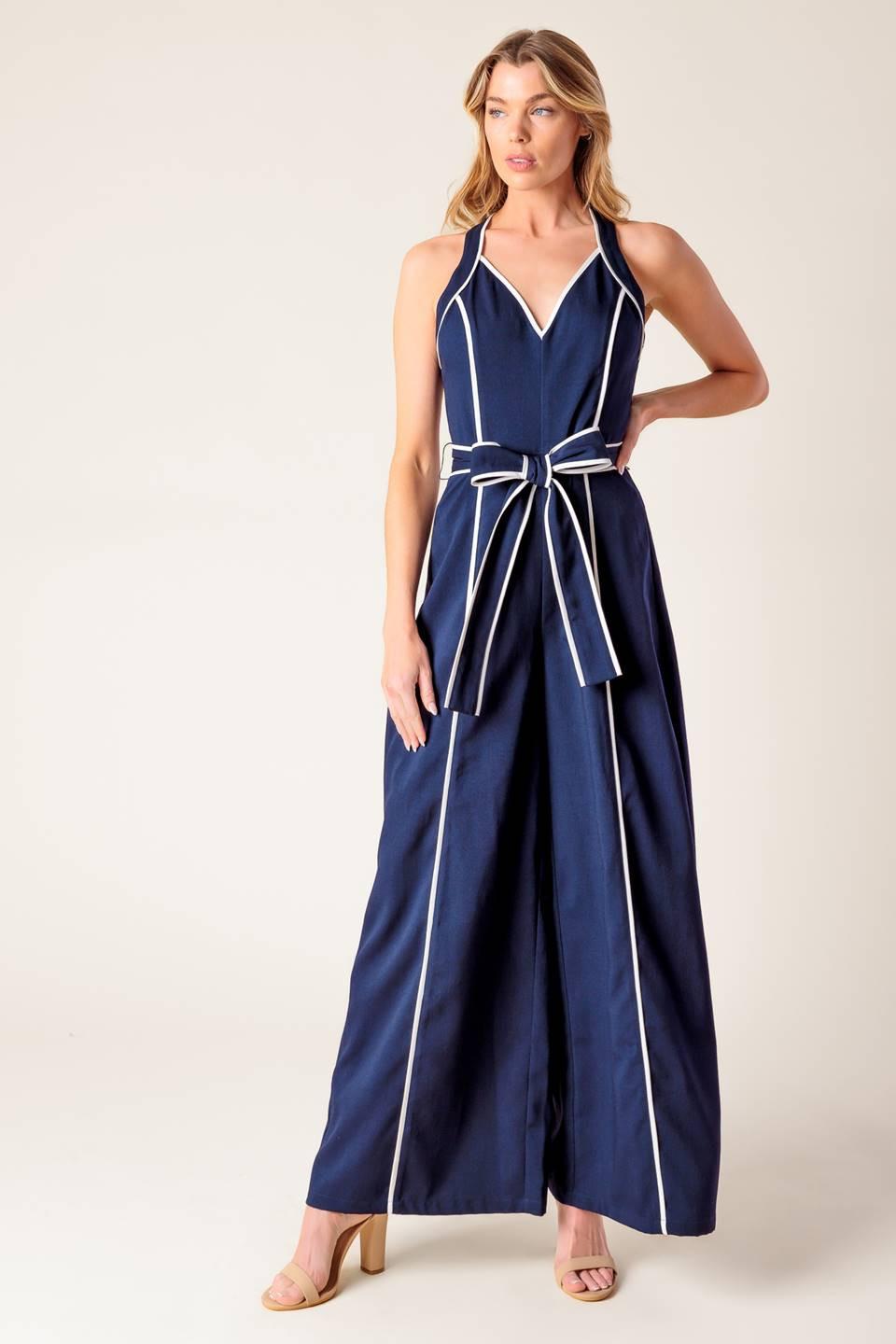 Detail of the elegant wide-leg design and comfortable drape of the Flying Tomato Layton Navy Woven Jumpsuit.