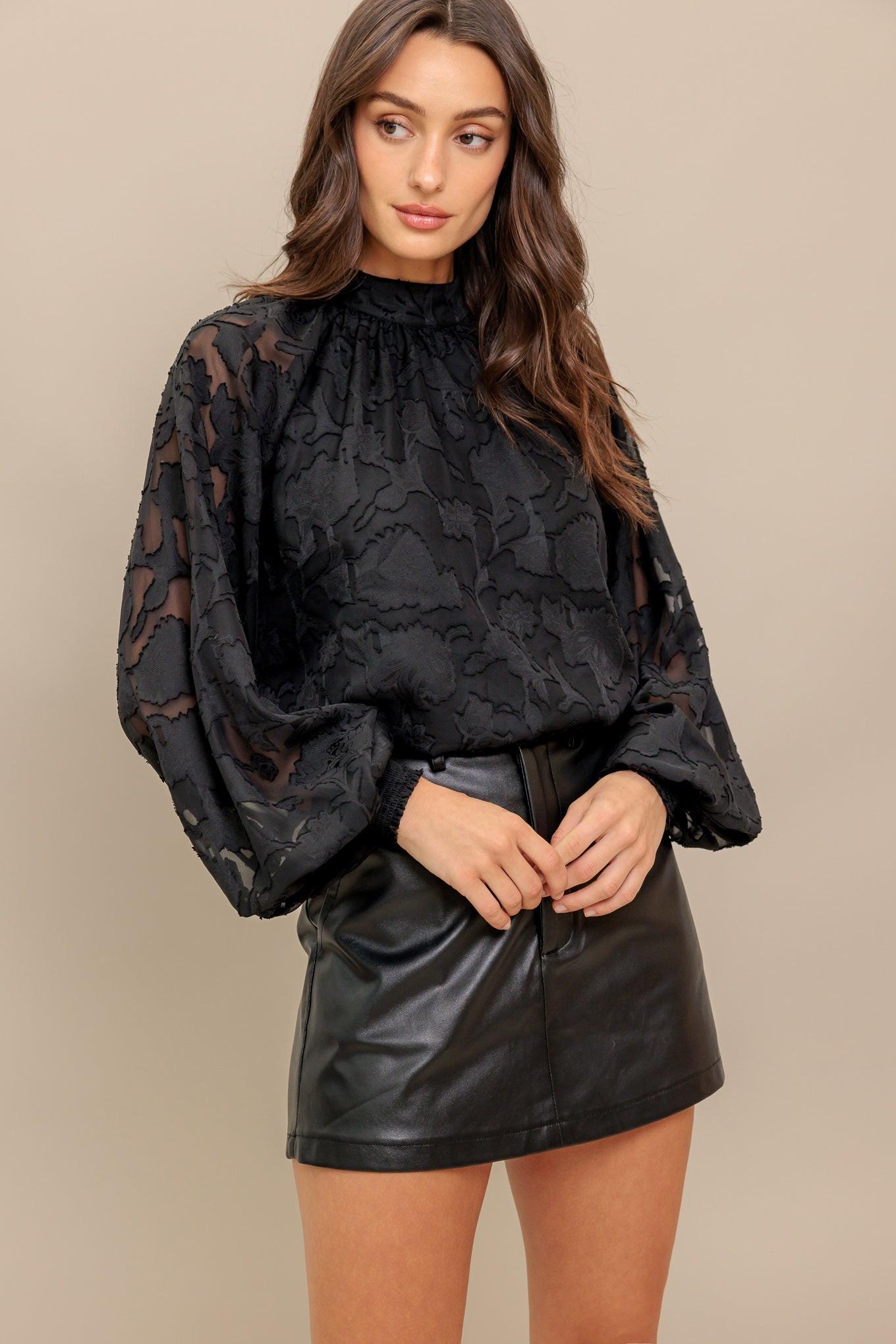 Hem detail of the Flying Tomato Solaris Dream Woven Top, showcasing its clean finish and quality construction in a women's wo