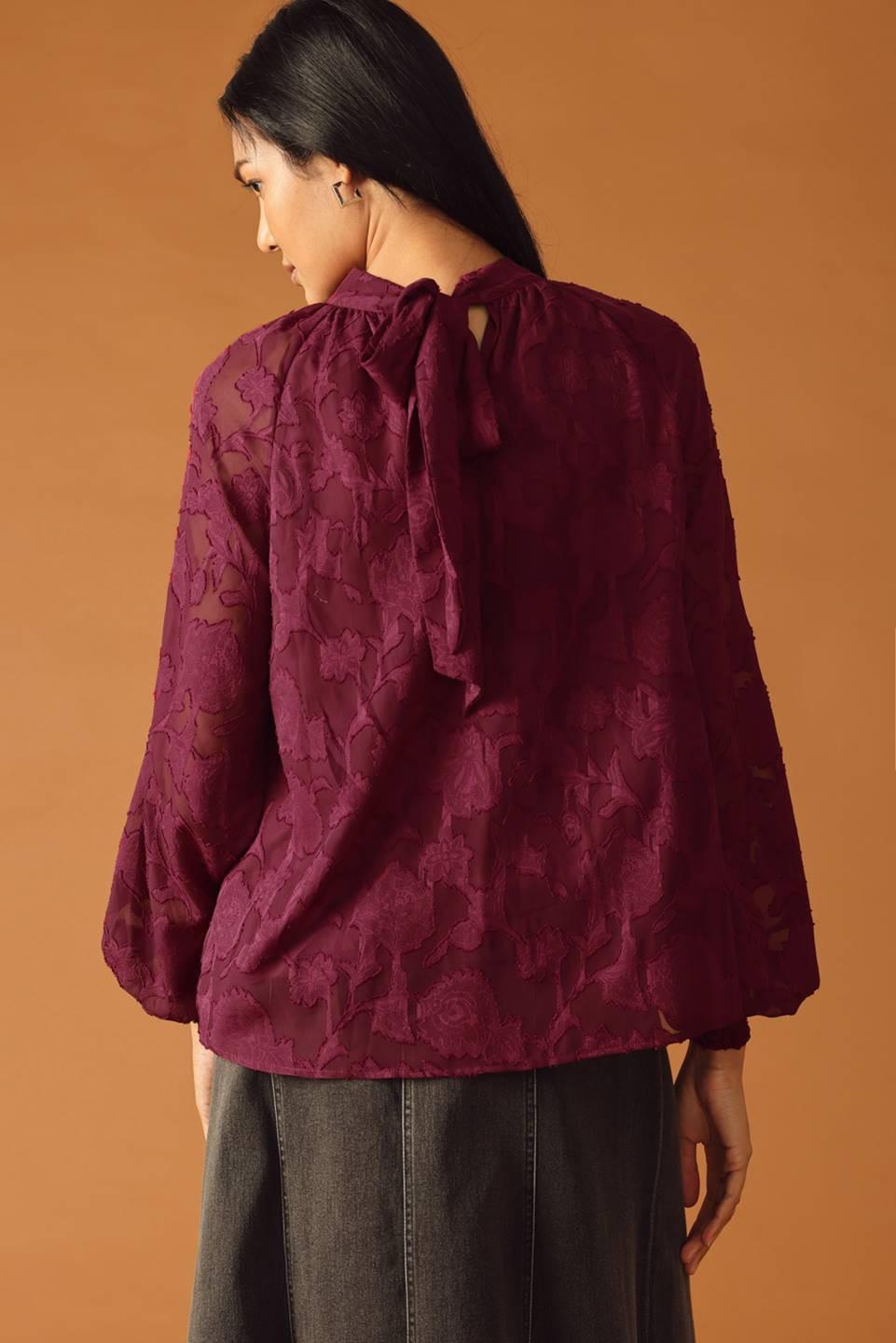 Detail of the elegant neckline and delicate sleeve design on the Flying Tomato Solaris Dream Woven Top, a refined women's blo