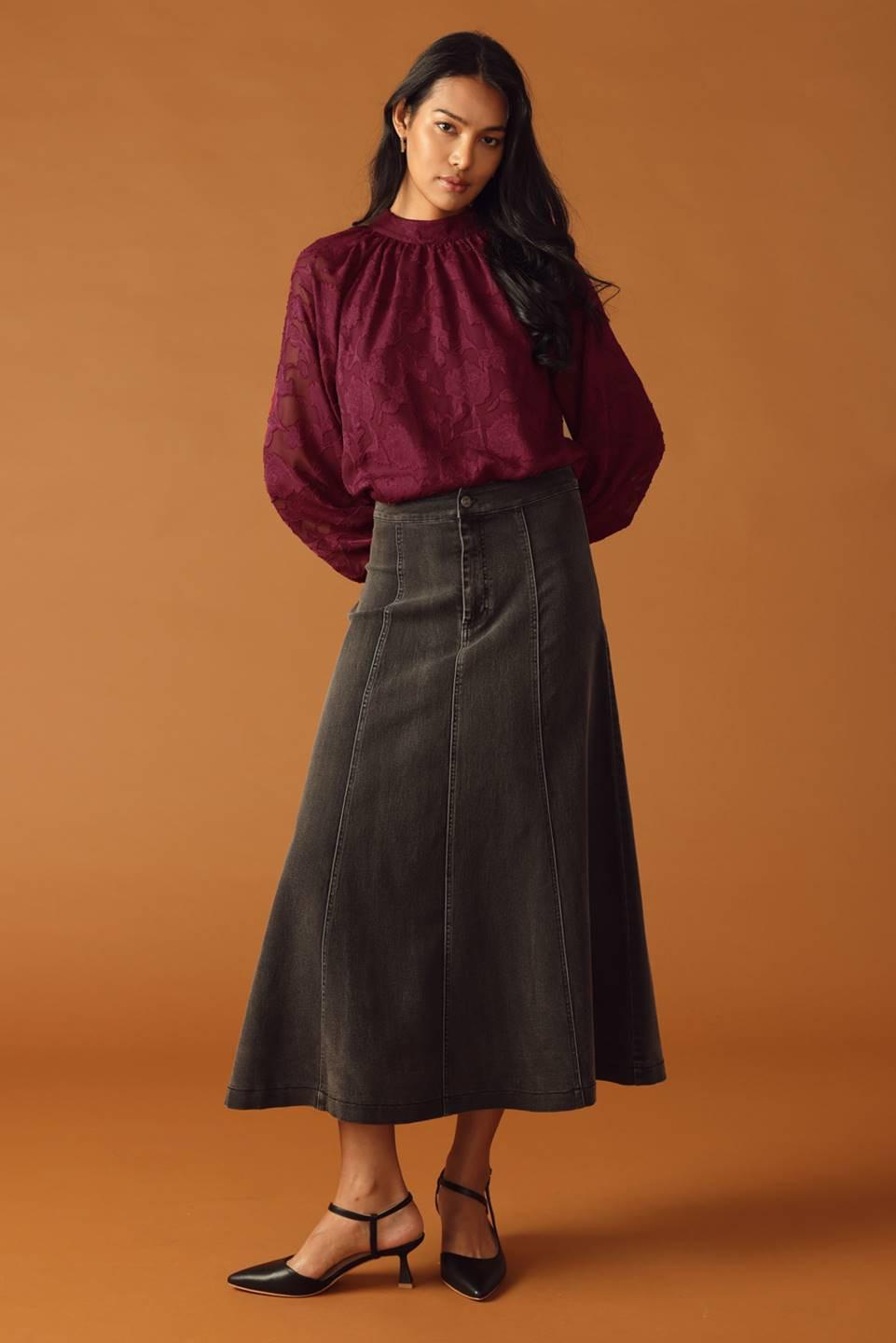 Flying Tomato Solaris Dream Woven Top worn by a model, demonstrating its comfortable fit and stylish appeal for various occas