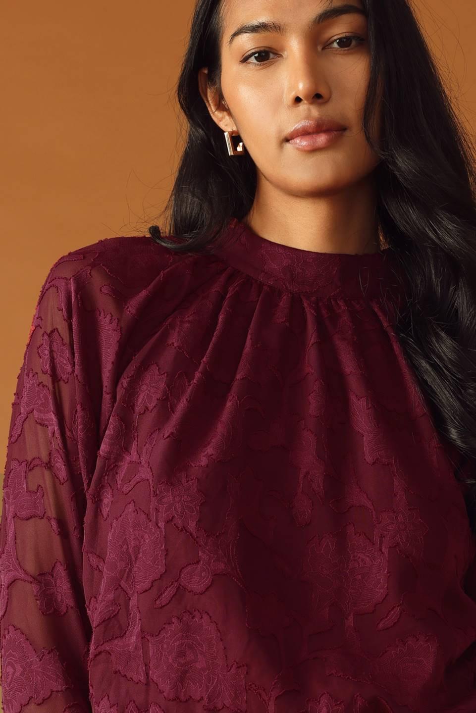 Flying Tomato Solaris Dream Woven Top styled casually, highlighting its versatility as a quality women's top for a relaxed, f