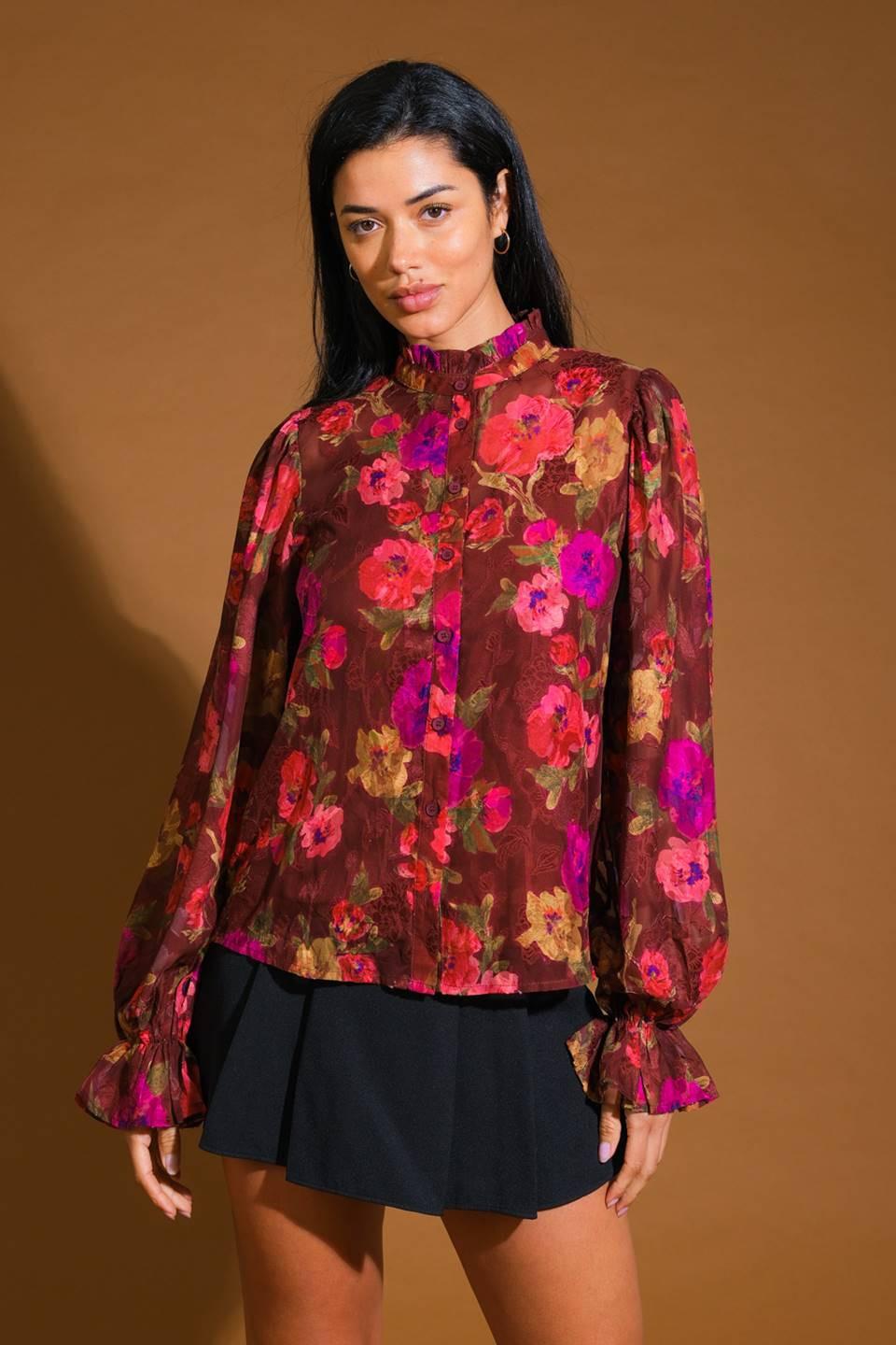 Flying Tomato Perfect Stunner Woven Top worn by a model, showcasing its elegant flow and versatile fashion appeal.
