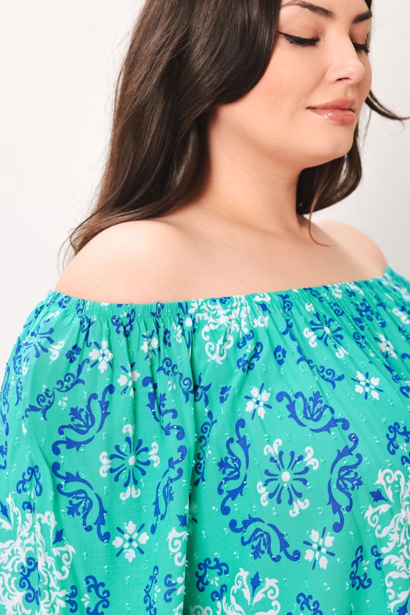 Model wearing the Flying Tomato Send My Love Woven Top from Love Salve, illustrating its comfortable fit and versatile stylin