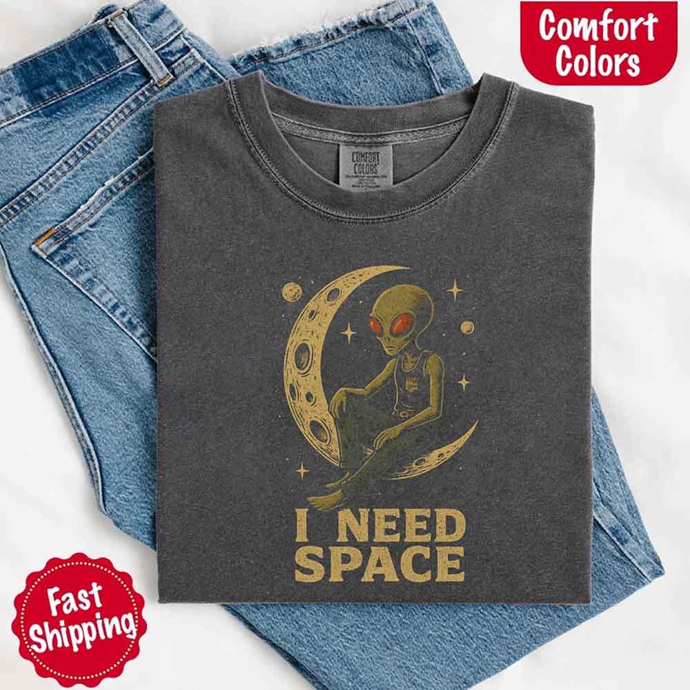 Lifestyle shot of the Adorb Custom Tees I Need Space Tee, worn by an individual, showcasing its appeal for those seeking uniq