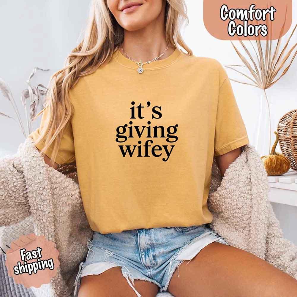 Adorb Custom Tees It’s Giving Wifey Comfort Colors Tee in a soft fabric, a perfect wedding gift for the bride to be.