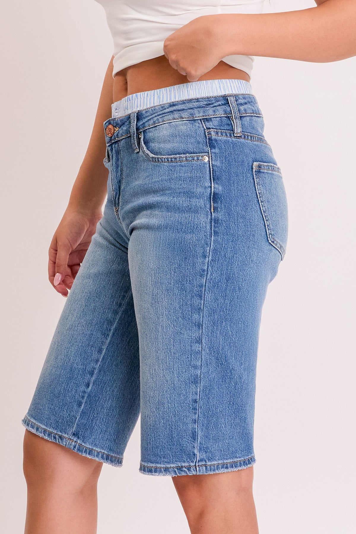 YMI JEANS Women's Luxe Jort styled for a summer outing, showing its versatility as a fashion denim short.