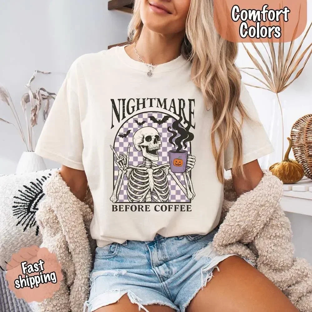 Adorb Custom Tees Nightmare Before Coffee shirt with a coffee mug, perfect for any coffee lover's Halloween wardrobe.