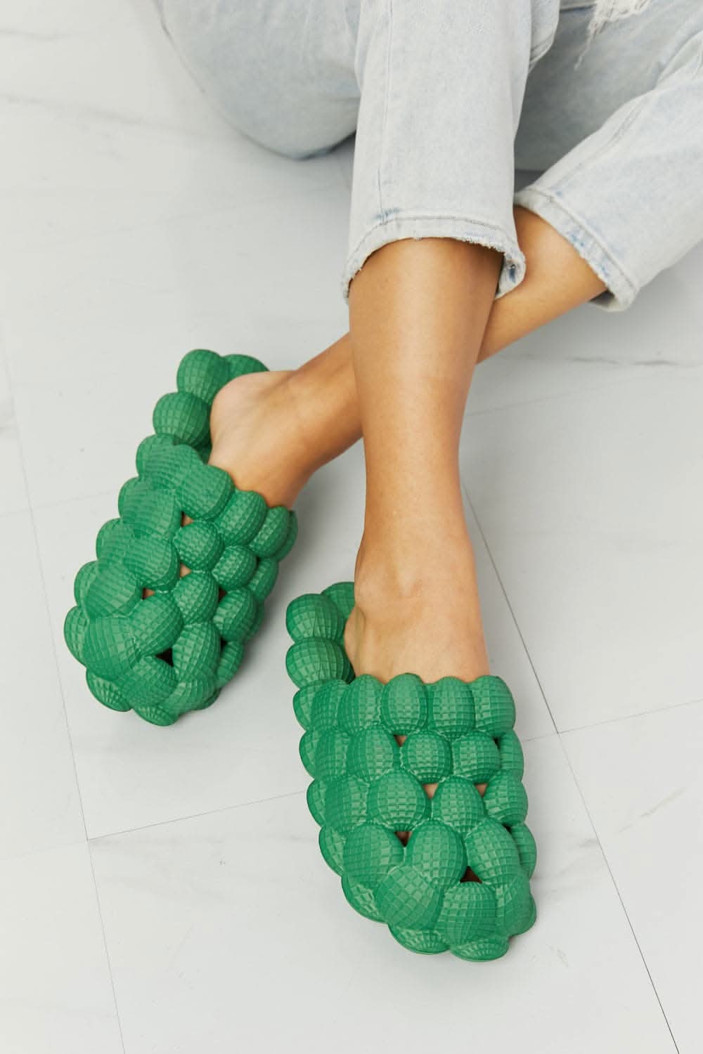 Nook Joi green bubble slides for comfort 