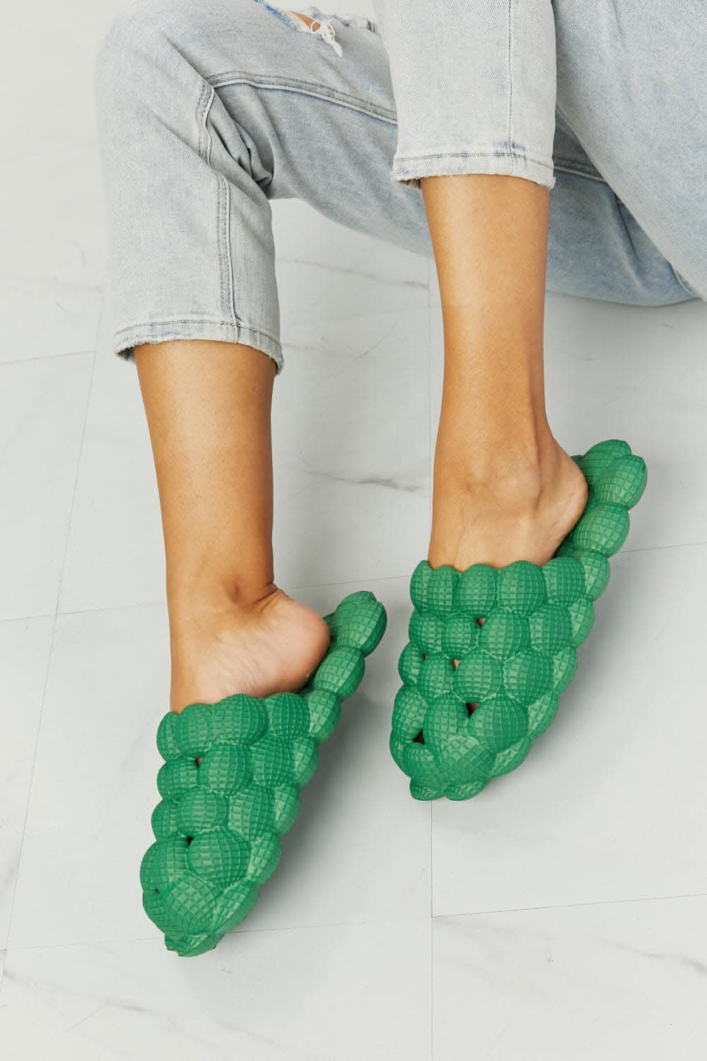 Nook Joi green bubble slides for comfort 