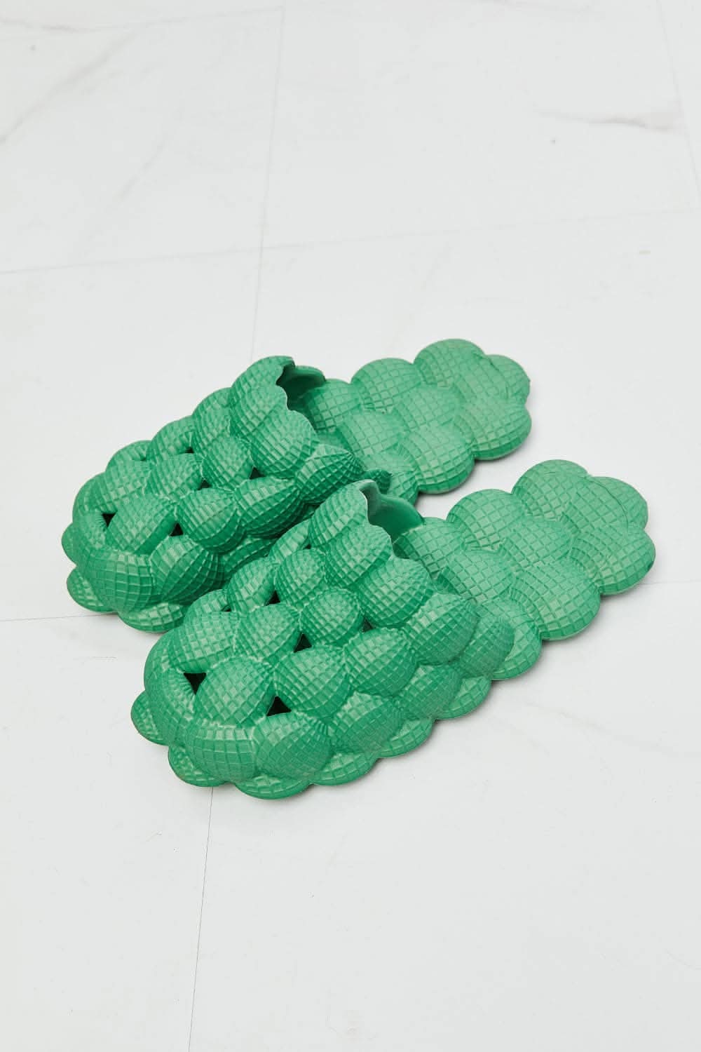 Nook Joi green bubble slides for comfort 