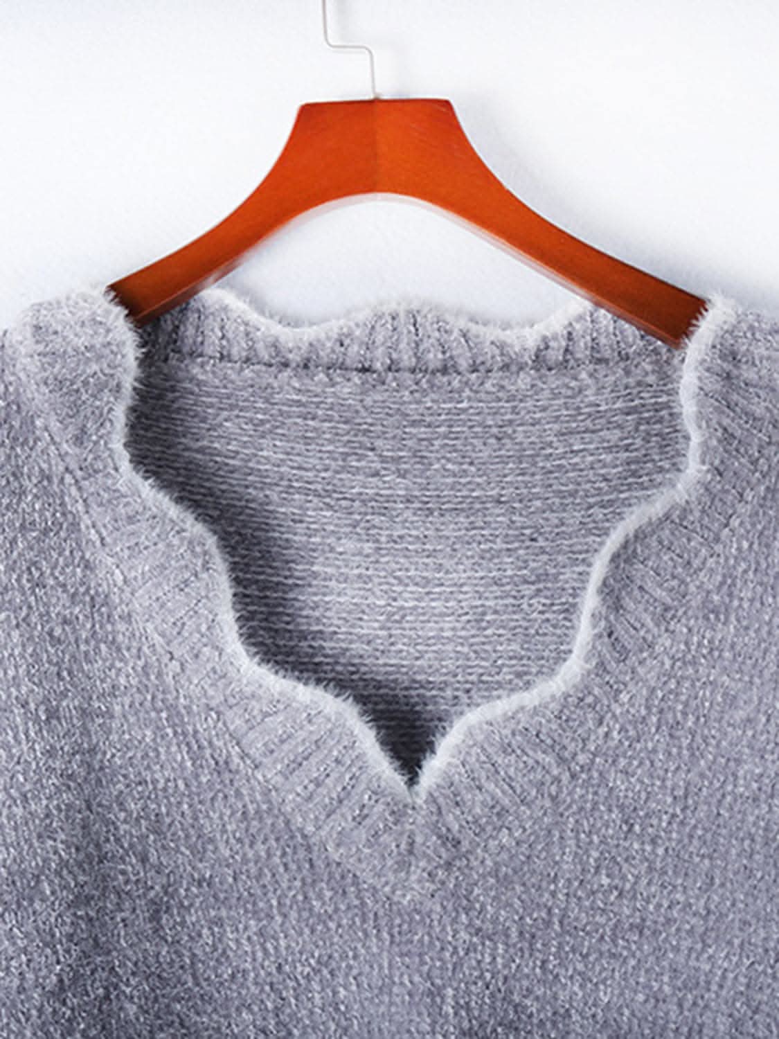 Notched shoulder long sleeve sweater 