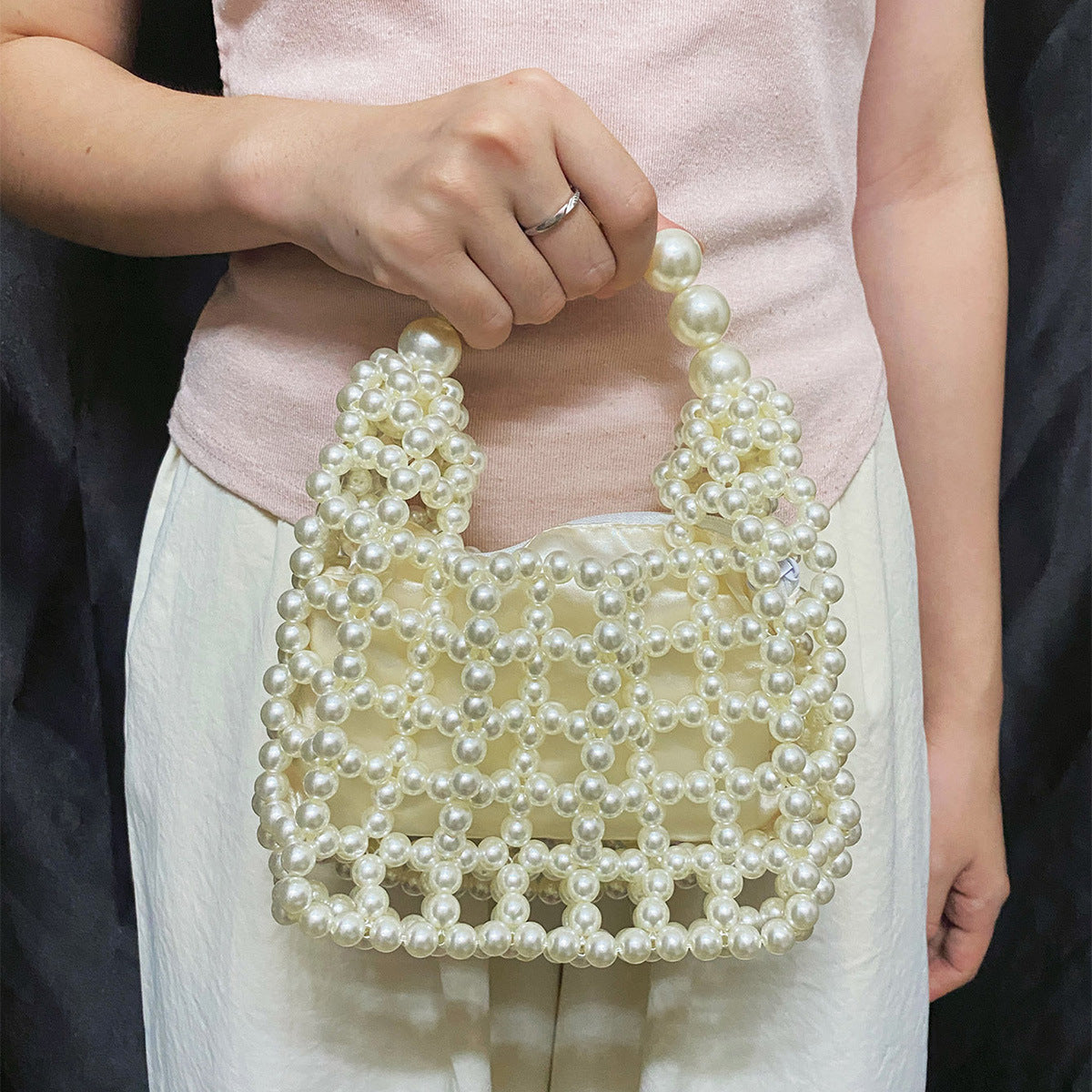 High Sense Minority Simple Elegant Hollow Out Cutout Handmade Beaded Dumpling Bag Retro Woven Handbag Bella Mia