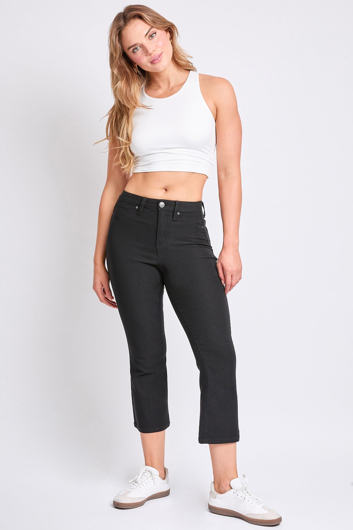Detail shot of the waistband and button closure on YMI JEANS Women's Hyperstretch Cropped Kick Flare Pants, quality craftsman