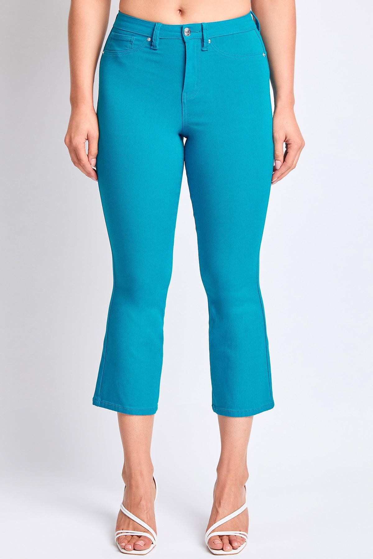 Detail of the YMI JEANS Women's Hyperstretch Cropped Kick Flare Pants waistband and closure, reflecting quality construction.