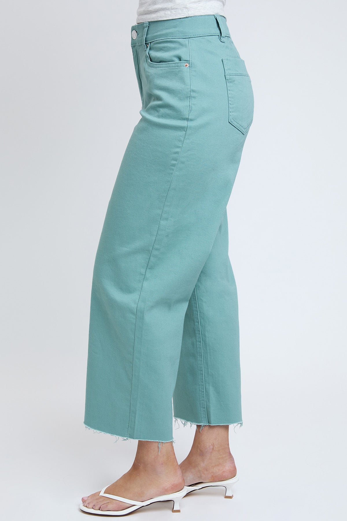 Model wearing YMI JEANS Women's High Rise Cropped Trouser Jeans, styled for a chic and comfortable casual look.