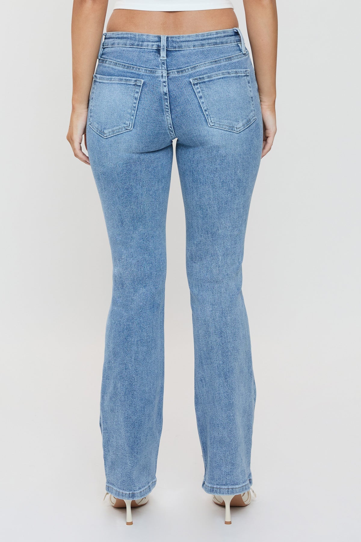 Model wearing YMI JEANS Women's Essential Bootcut Jeans, demonstrating the versatile fit for everyday style and comfort.