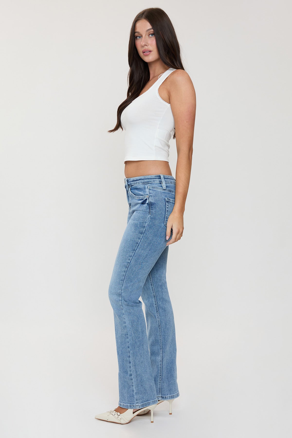 YMI JEANS Women's Essential Bootcut Jeans, rear view, emphasizing the stylish pocket design and comfortable stretch blue deni