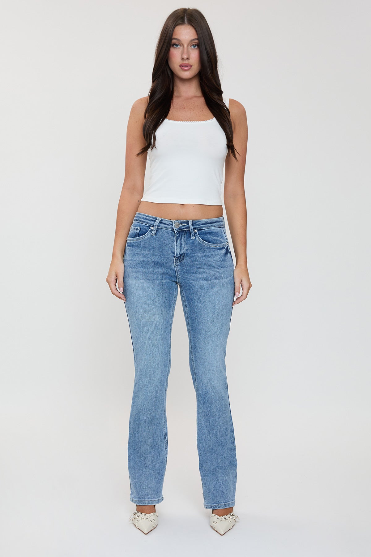YMI JEANS Women's Essential Bootcut Jeans in classic blue denim, showcasing their flattering full-length silhouette.