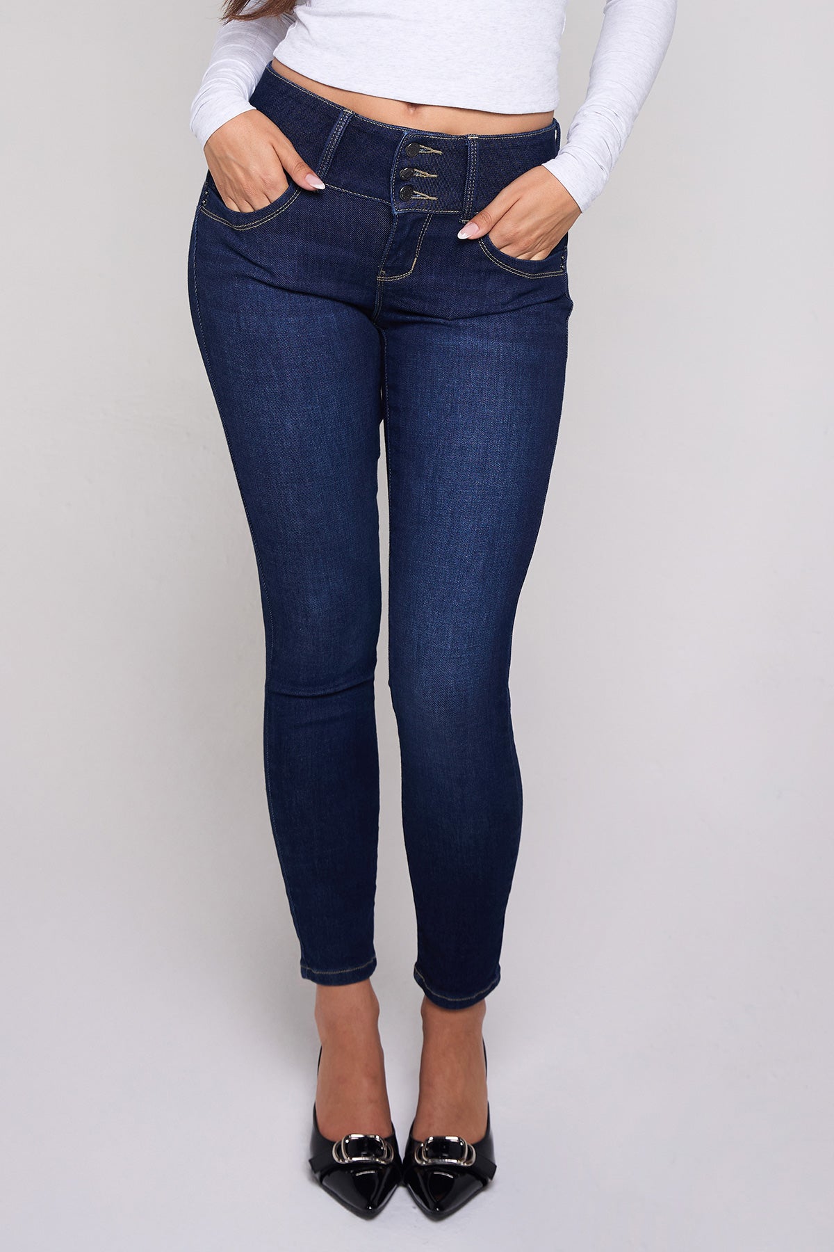 YMI JEANS Women's WannaBettaButt Skinny Jeans, detailed view of the mid-rise waistband and belt loops.