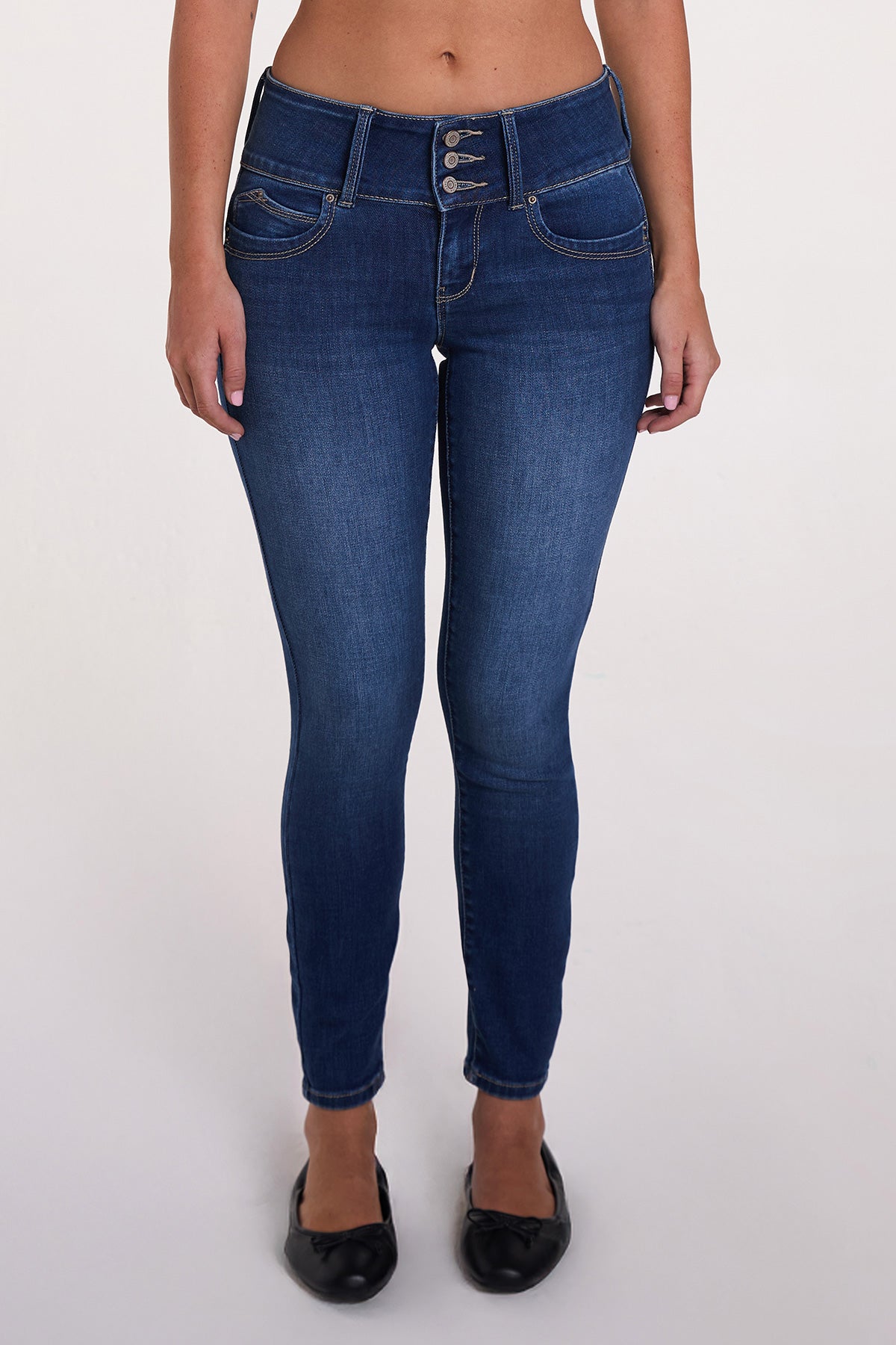 Close-up of the YMI JEANS Luxe Mid Rise 3-Button WannaBettaButt Skinny Jeans waistband with triple button closure detail.