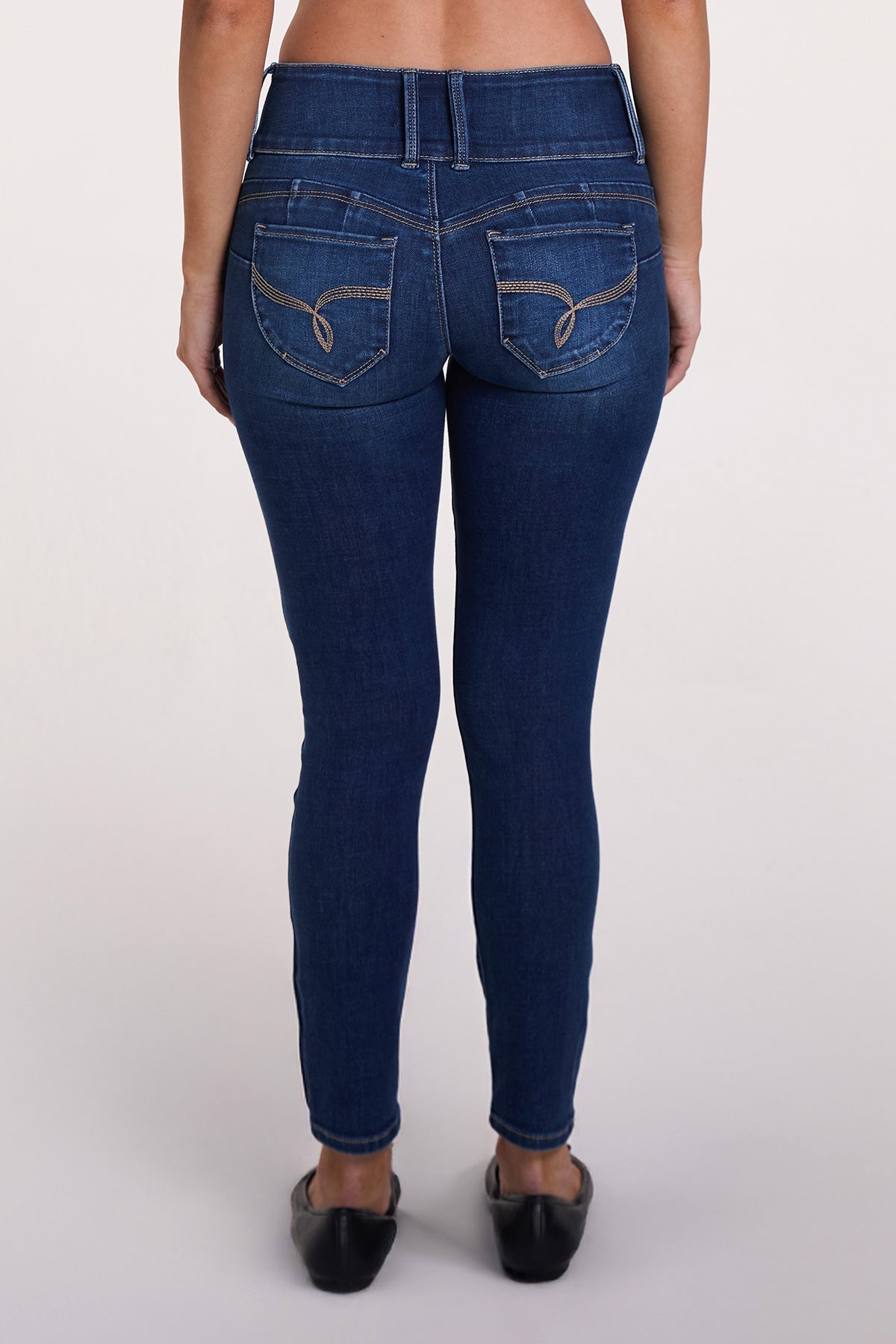 Detailed shot of the YMI JEANS WannaBettaButt Skinny Jeans fabric texture, a comfortable stretch denim material.