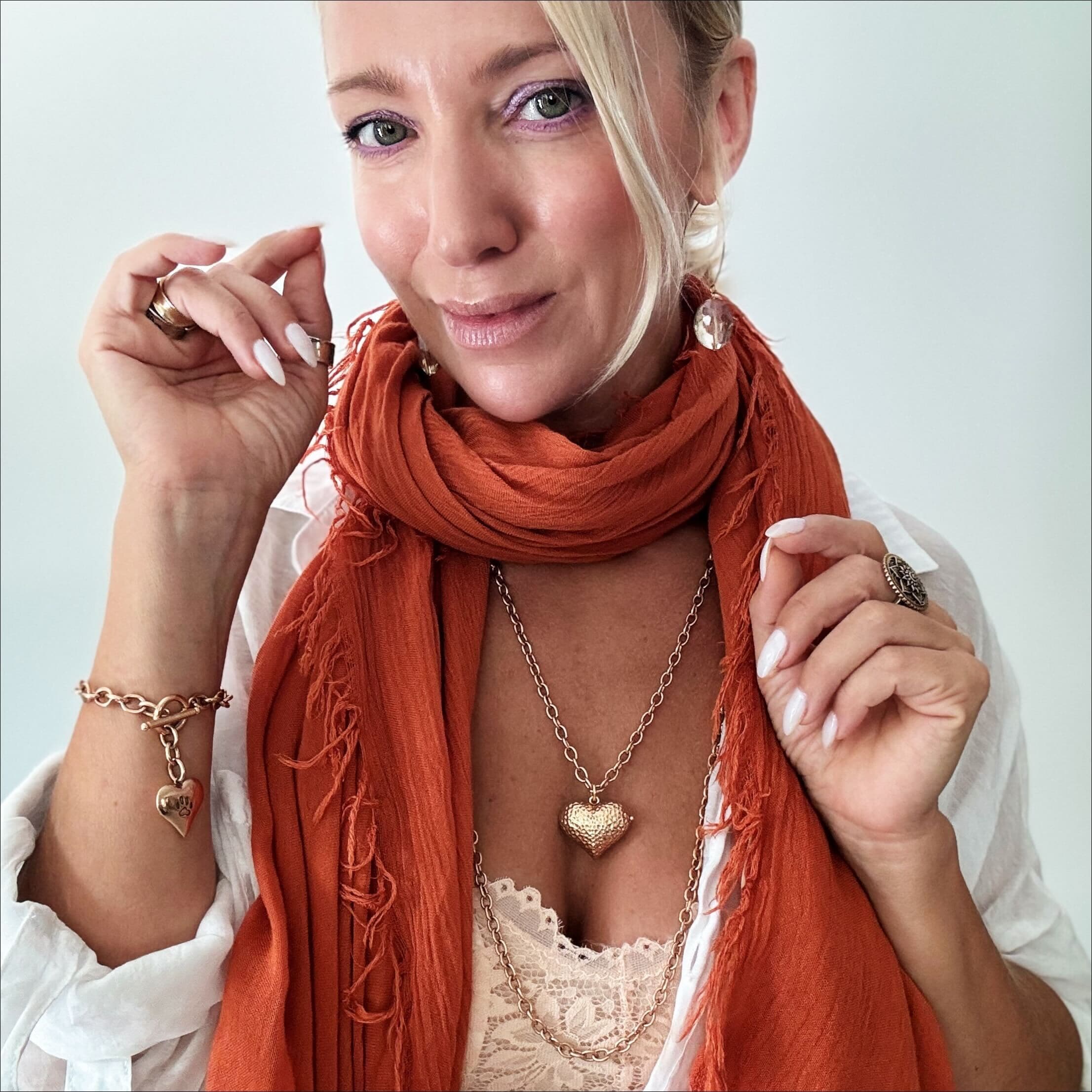 Katia Designs Follow Your Heart Locket Essential Necklace, worn gracefully, illustrating its elegant drape and versatile styl