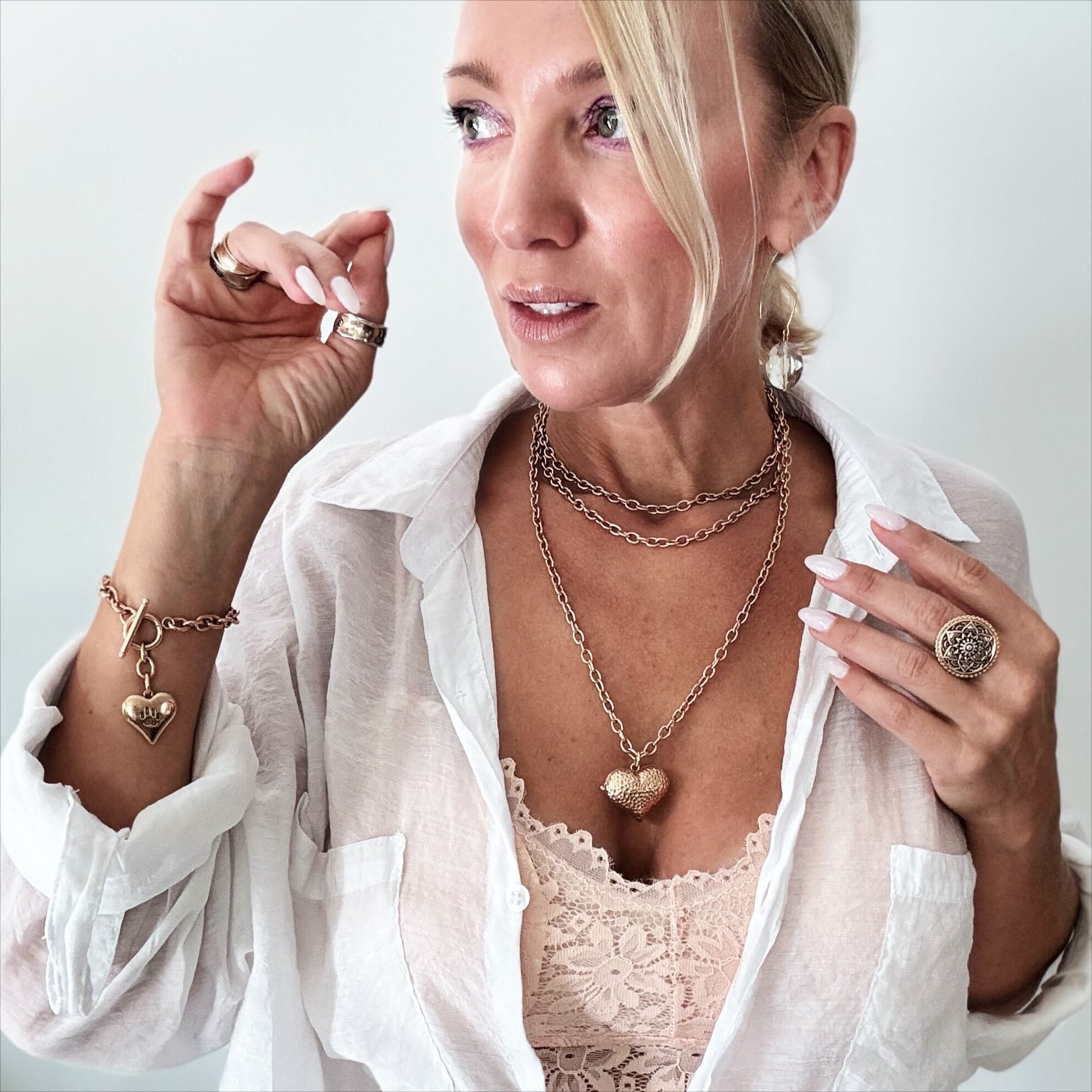 Katia Designs Follow Your Heart Locket Essential Necklace, a detailed shot of the secure clasp and chain links.