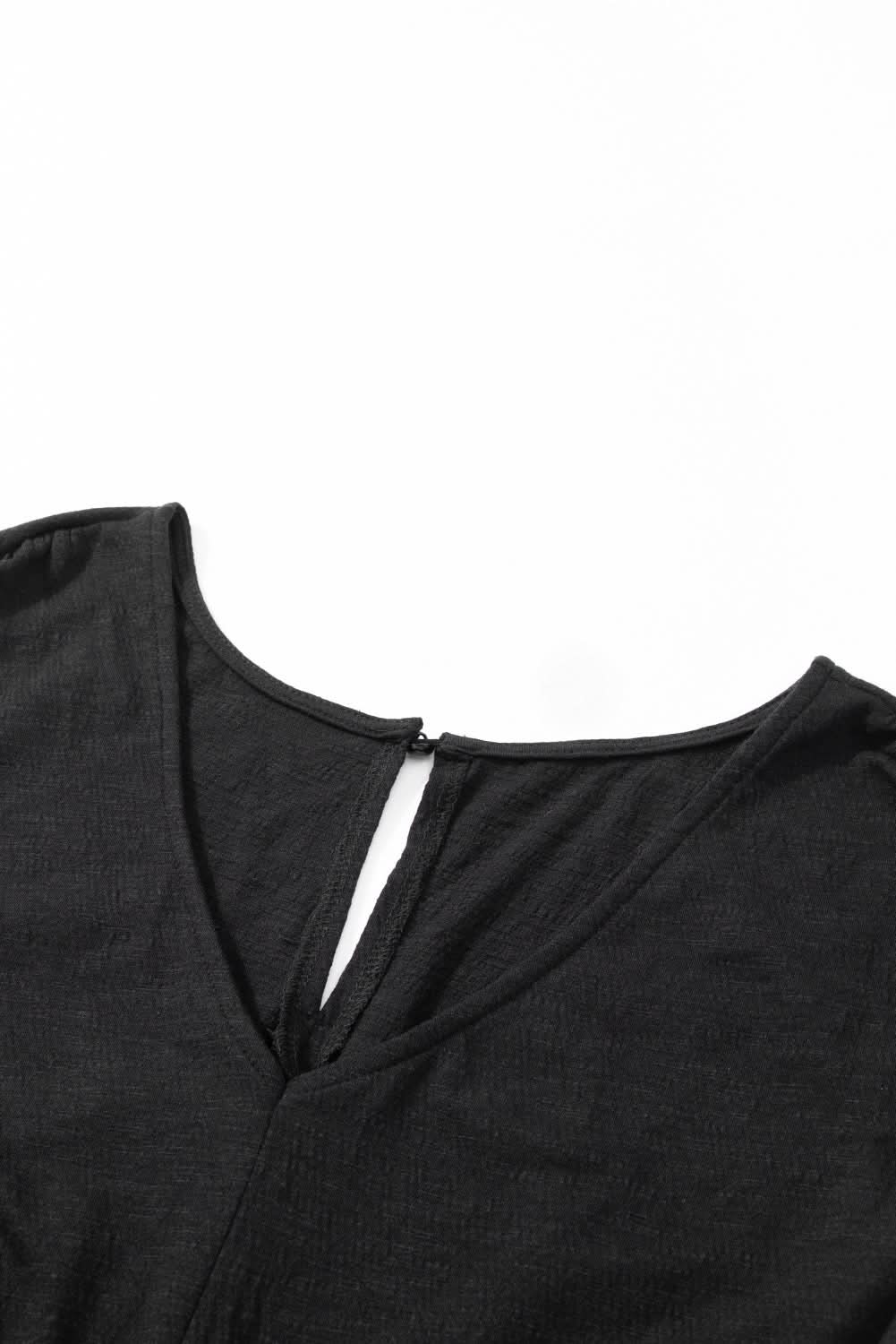 Plus size black smocked jumpsuit 