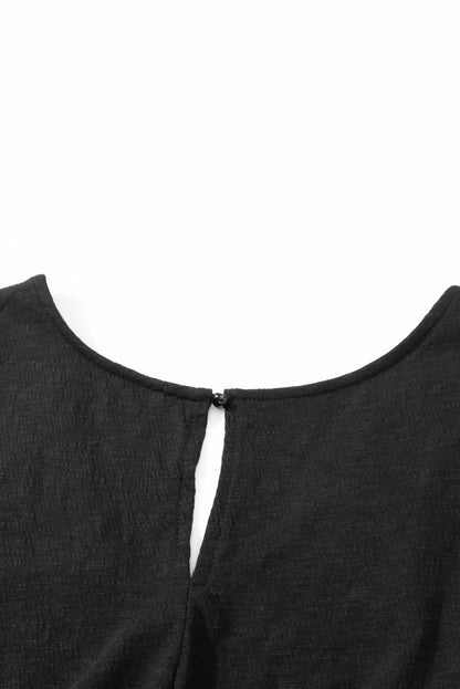 Plus size black smocked jumpsuit 