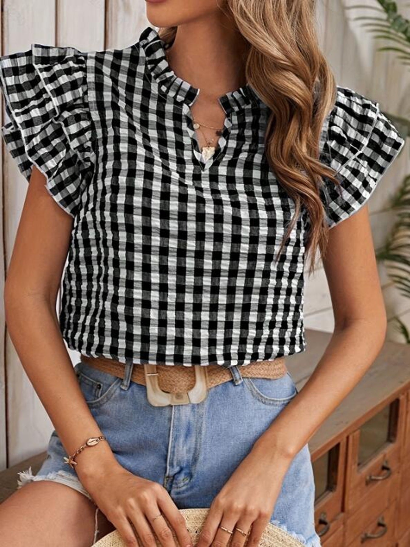 Miss Sparkling gingham blouse worn styled with neutral accessories
