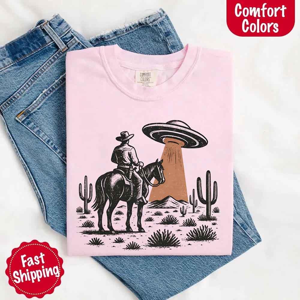 Adorb Custom Tees Retro UFO Cowboy Tee, a premium Comfort Colors shirt, displayed flat to emphasize the full graphic and fabr