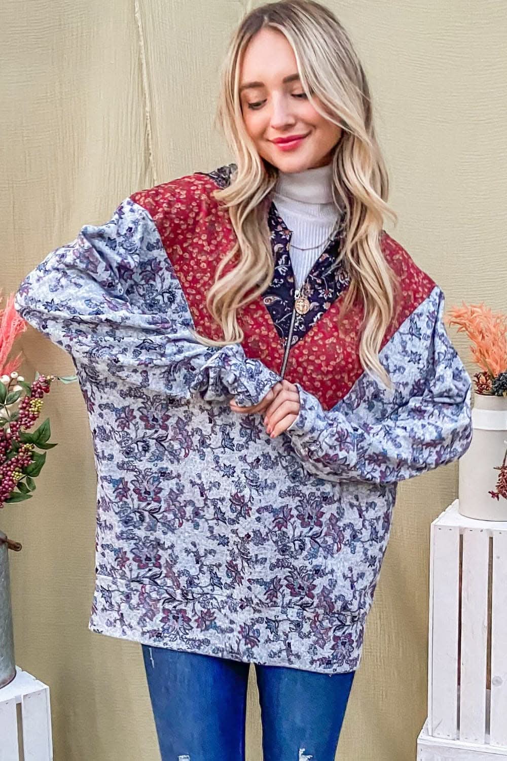 Stylish half zip hoodie with printed flair 