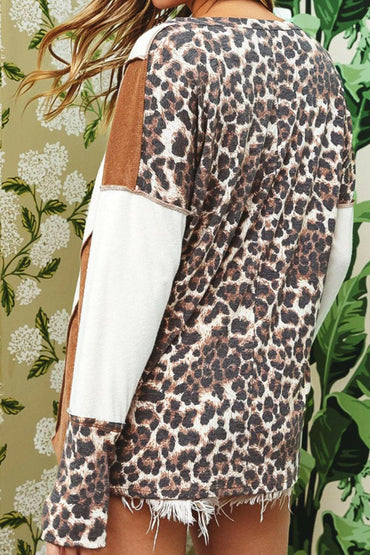 Leopard V-Neck Dropped Shoulder BlouseUpgrade Your Wardrobe with Style and Comfort
 Indulge in effortless elegance with our Leopard V-Neck Dropped Shoulder Blouse. This versatile blouse is a must-have foLove Salve -Neck Dropped Shoulder BlouseBlouses