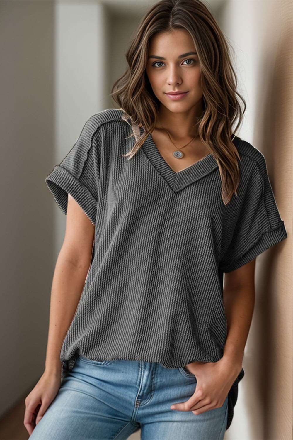 Textured V-Neck Short Sleeve Top.