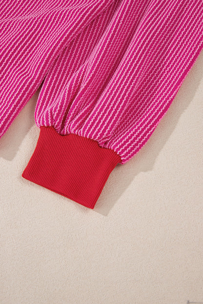 Bright pink drop shoulder top