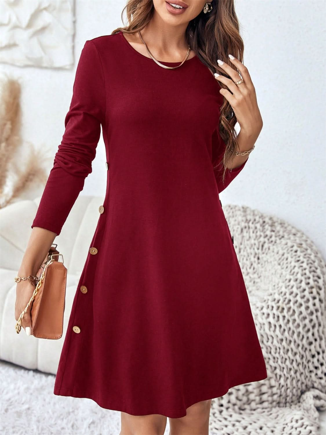 Chic mini dress with pockets and decorative buttons