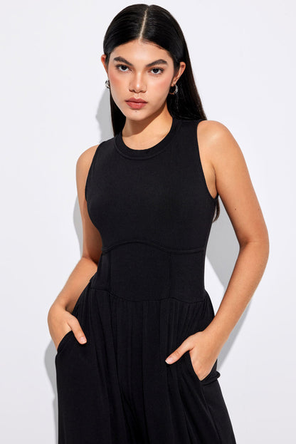 Chic black sleeveless jumpsuit with cinched waist and wide legs