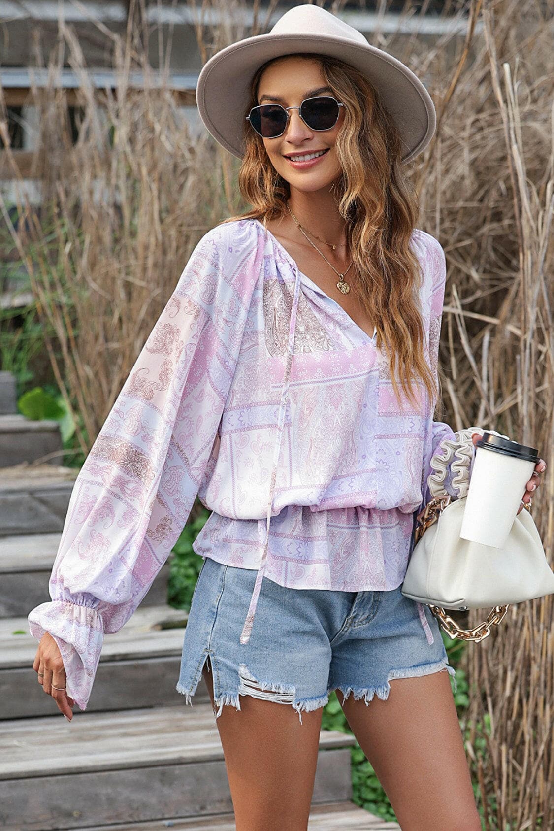 Printed Tie Neck Flounce Sleeve Blouse.