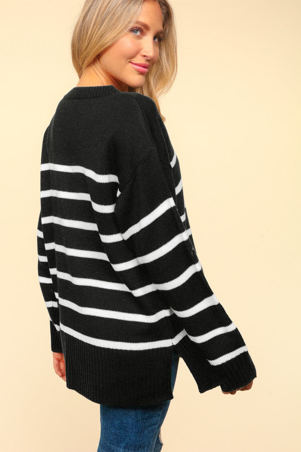 Striped side slit sweater with a modern twist