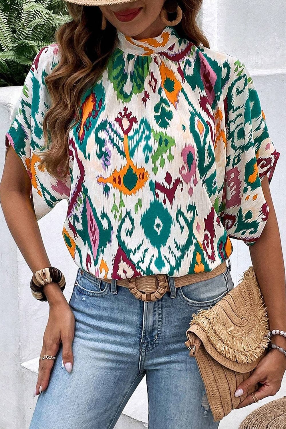 Printed Mock Neck Half Sleeve Blouse.