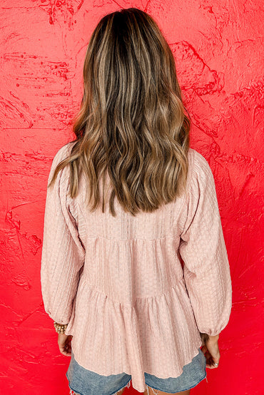 Chic tiered flowy blouse in soft pink texture