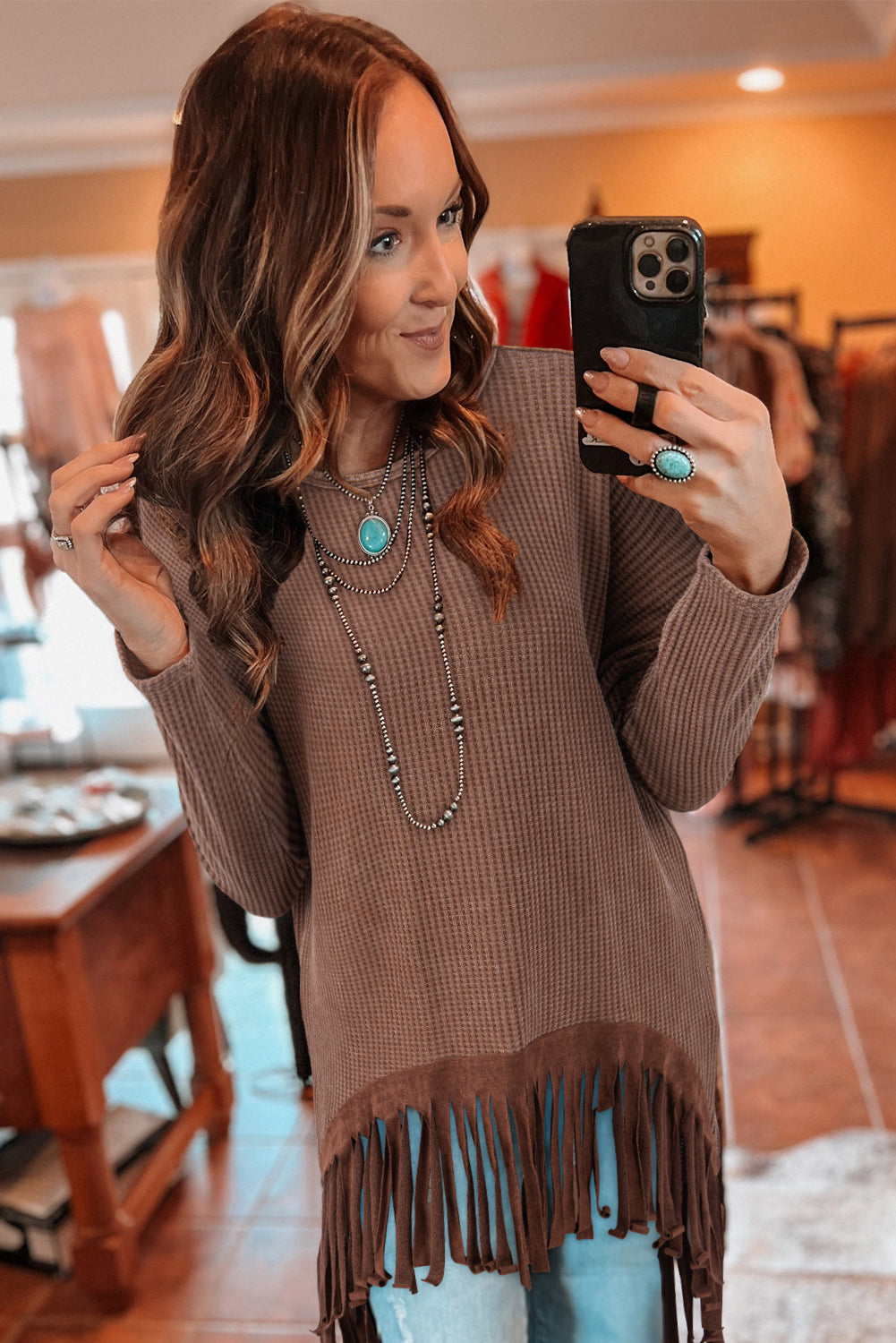 Chic coffee waffle knit top with fringed hem and high-low design