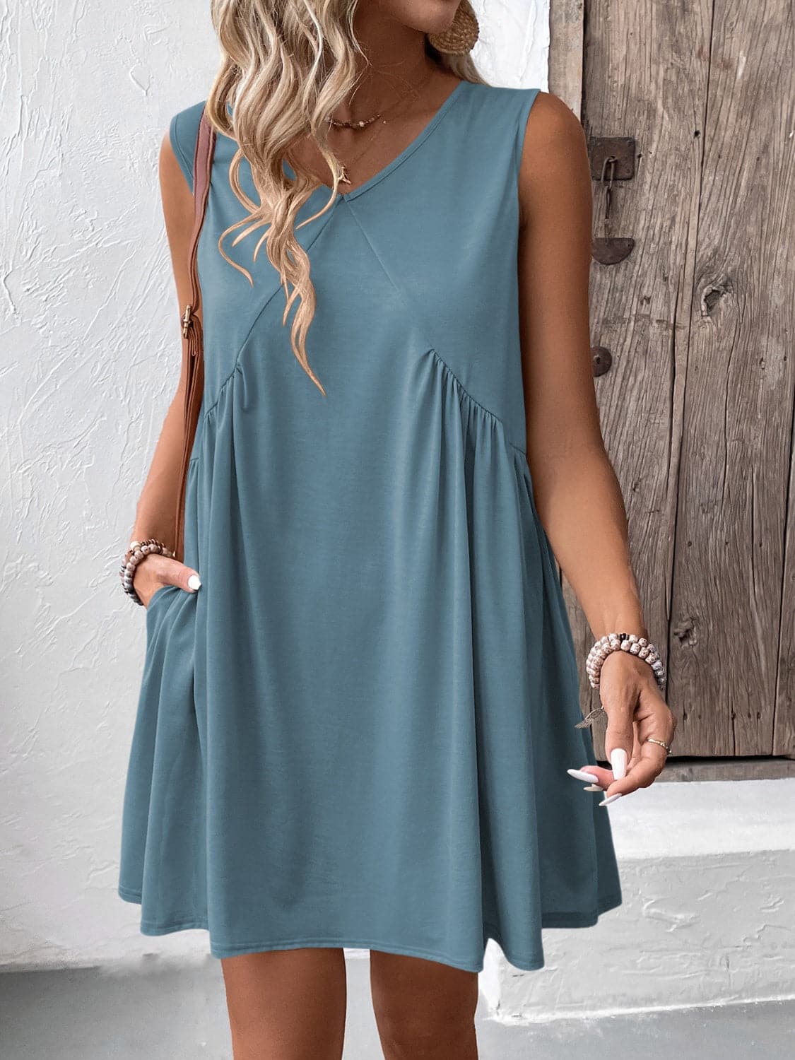 Ruched V-Neck Sleeveless Mini Dress.