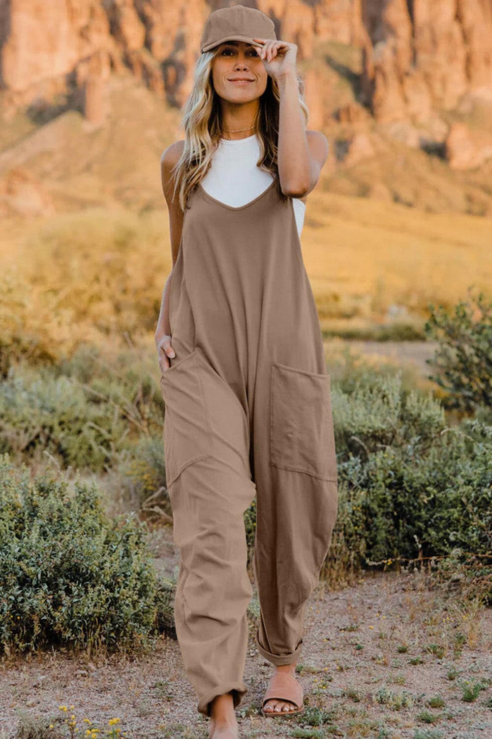 Double Take Full Size V-Neck Sleeveless Jumpsuit with PocketsUpgrade Your Style
 Introducing the Double Take Full Size V-Neck Sleeveless Jumpsuit with Pockets – where fashion meets functionality! This chic jumpsuit is designedLove Salve -Neck Sleeveless Jumpsuitusa