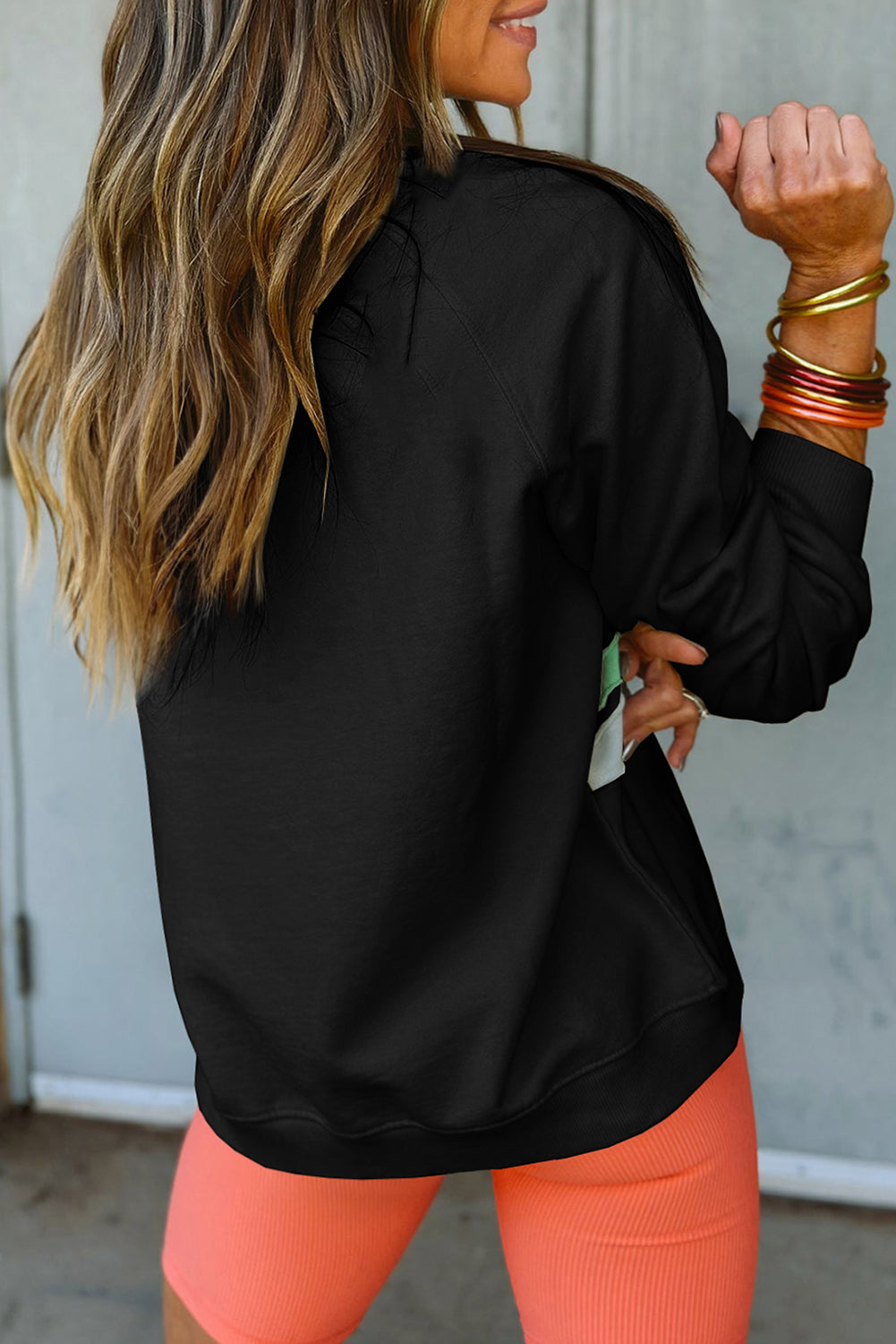 Plus size black rainbow raglan sweatshirt for vibrant style