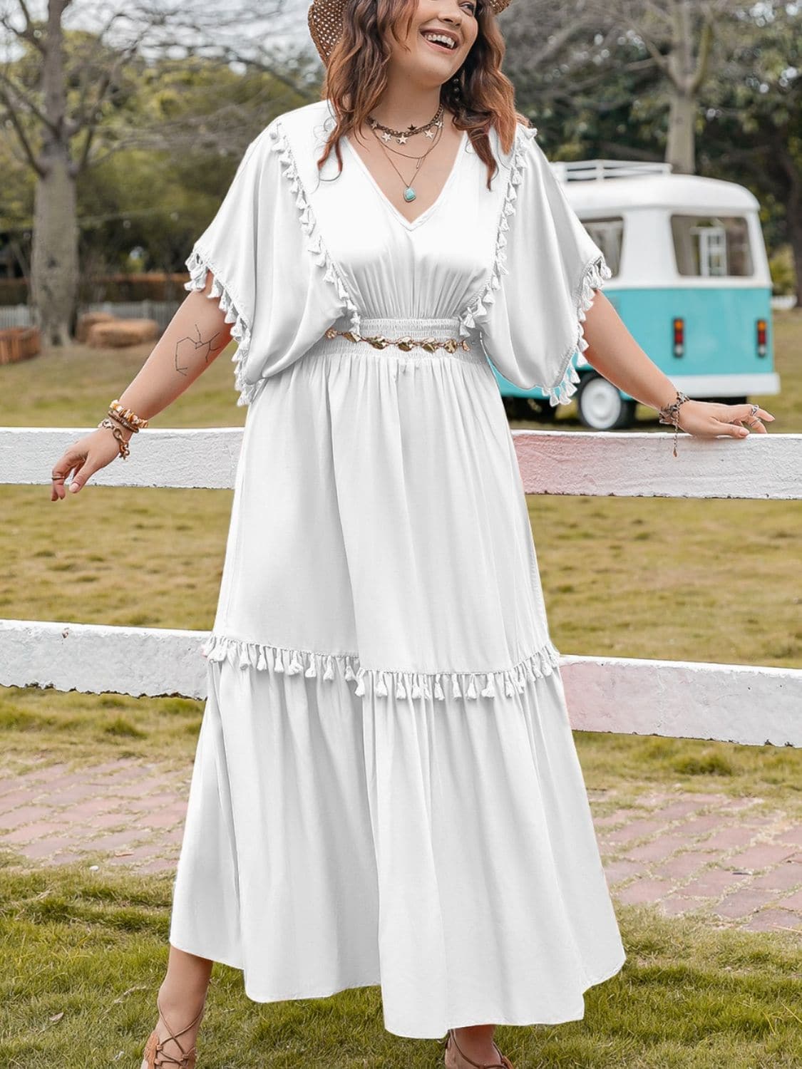 Plus Size Tassel Smocked V-Neck Half Sleeve Dress.