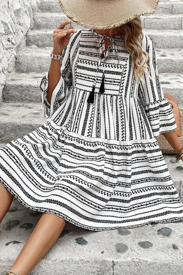 Chic printed tie neck mini dress with three-quarter sleeves