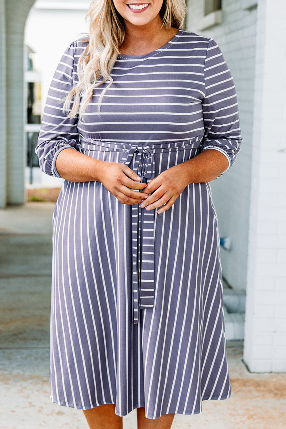 Chic gray striped plus size dress with tie waist and 3/4 sleeves