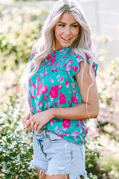 Floral green ruffled blouse with flutter sleeves