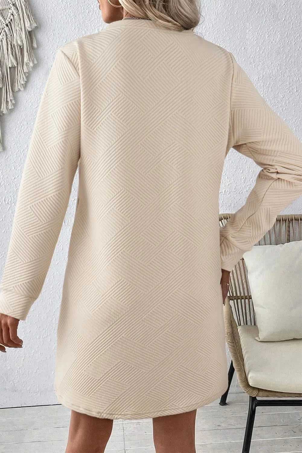 Textured long sleeve mini dress with round neck